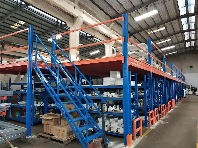 Mezzanine racking system installed in a warehouse, showing two storage levels with workers operating