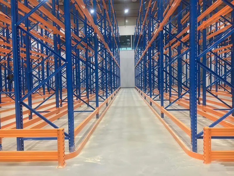 Engineered structural detail of high-rise very narrow aisle racking system with reinforced upright frames and beams.